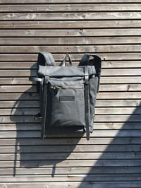 Image 3 of Waxed canvas backpack with roll to close top and zipper outside pocket