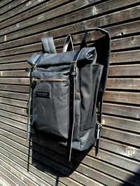 Image 4 of Waxed canvas backpack with roll to close top and zipper outside pocket
