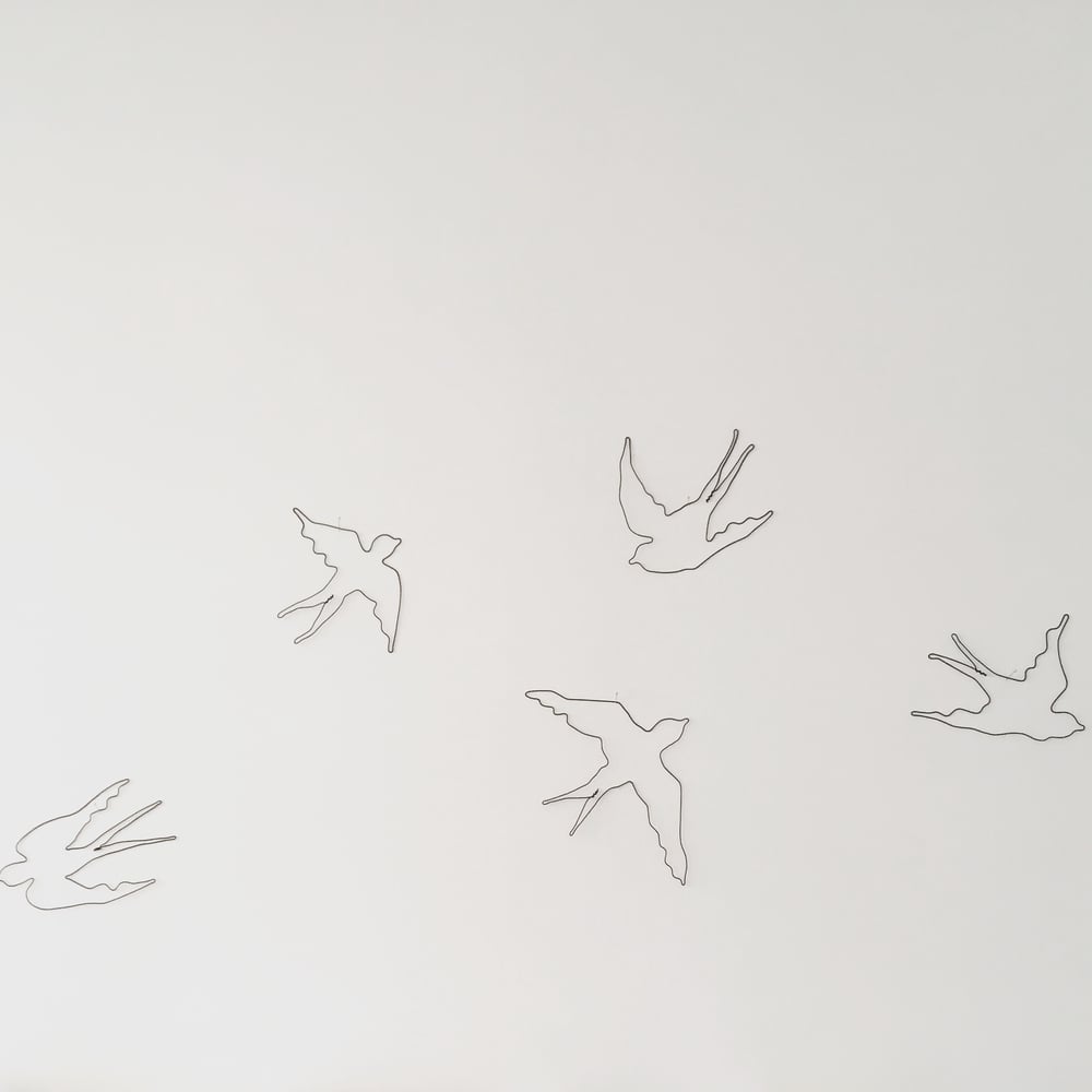 Image of Grande envolée d'hirondelles!