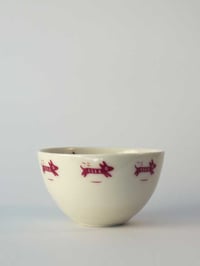 Image 1 of Bowl with </br>pink dogs