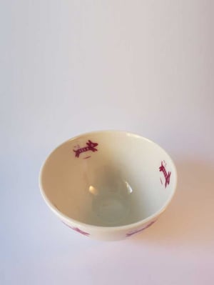 Image of Bowl with </br>pink dogs