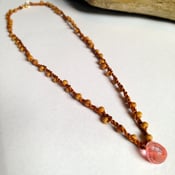 Image of sandalwood, cherry quartz, silk crocheted necklace