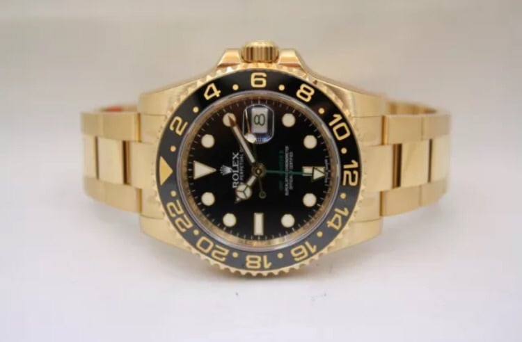 Image of Rolex GMT ii 18k retail 36000.00