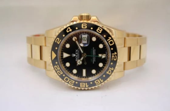Image of Rolex GMT ii 18k retail 36000.00