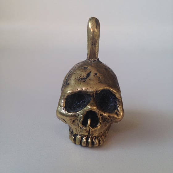 Image of The Live Large Die Once skull pendant