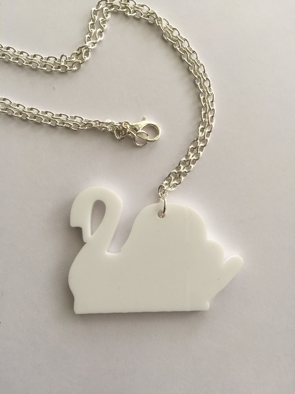 Image of LIP -Laser cut, white perspex Swan necklace
