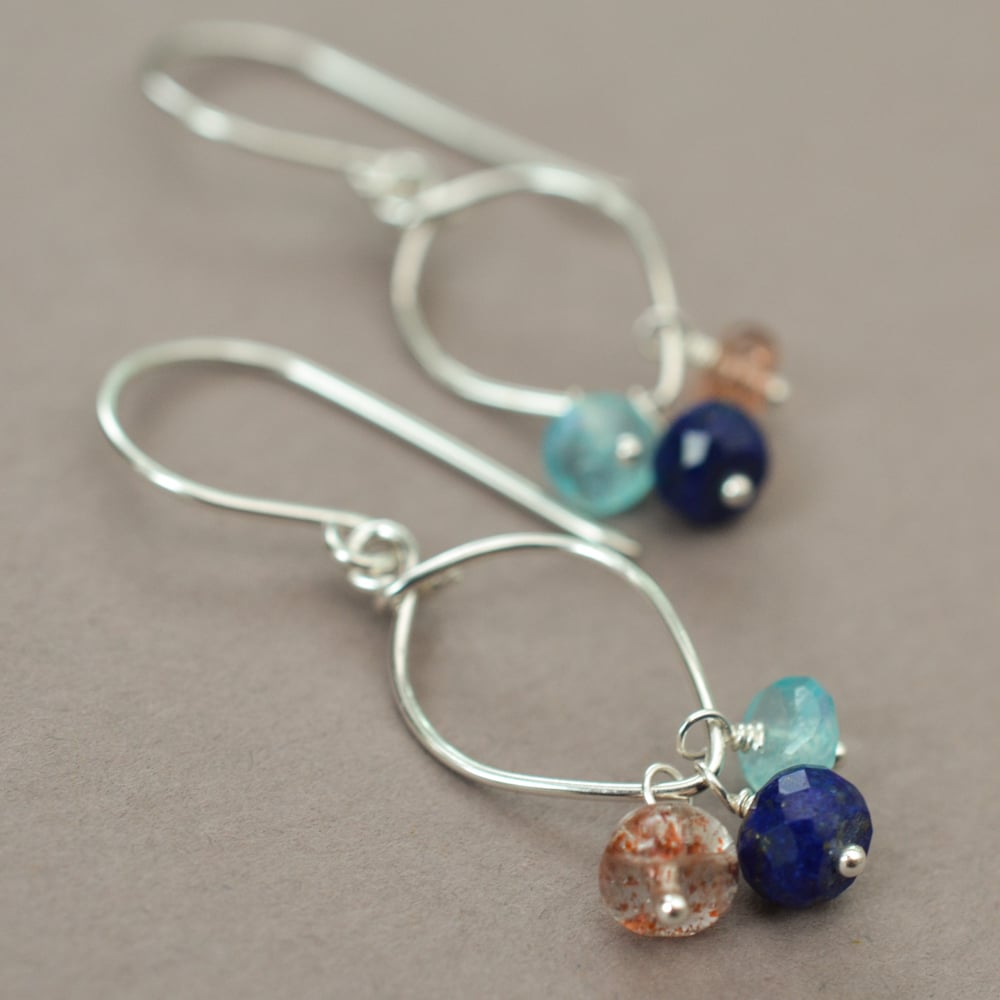Image of Lapis lazuli earrings sterling silver sunstone rainbow moonstone lotus loop