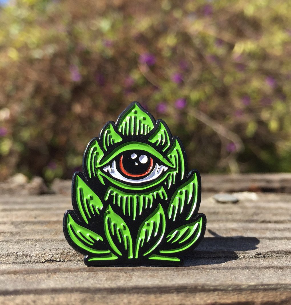 "Hop Eye" enamel pin Scraped Knee The Art of Matt Leunig