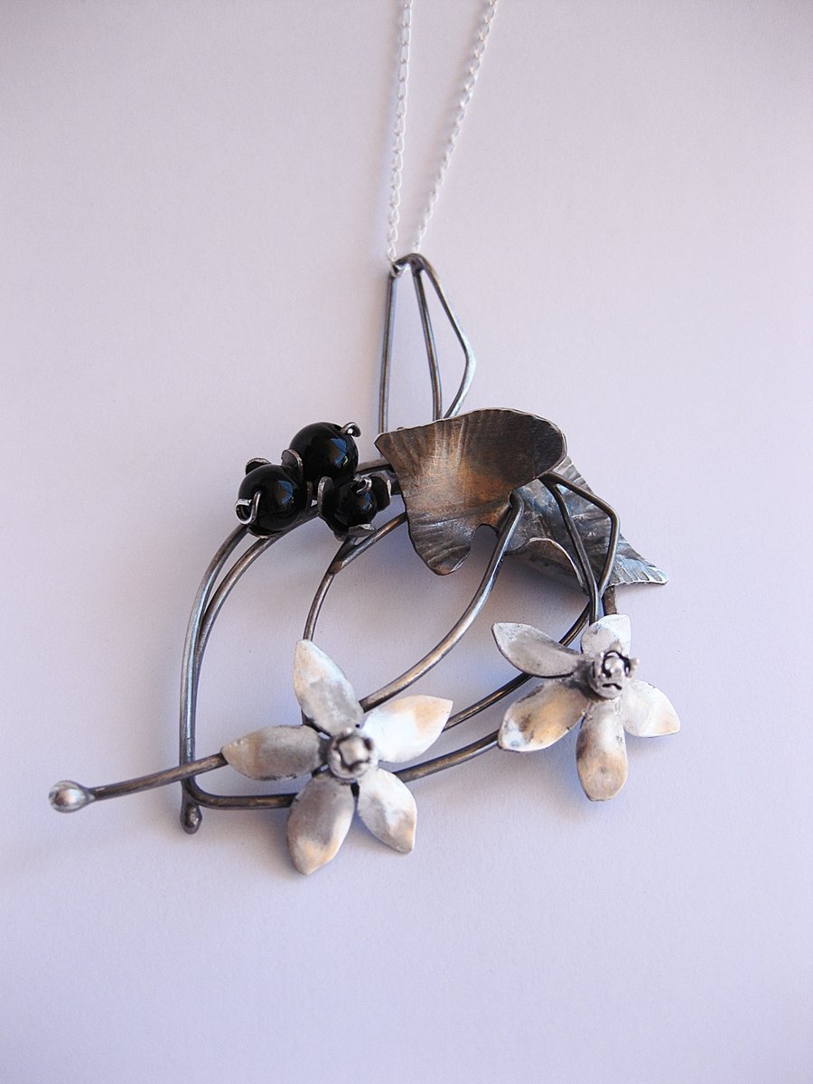 Image of Night shade wreath pendant