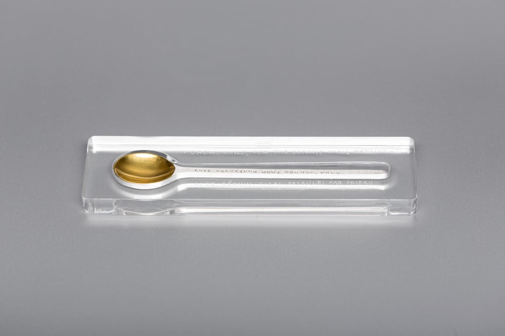 Image of silver small spoon with gilding and inscription in Latin