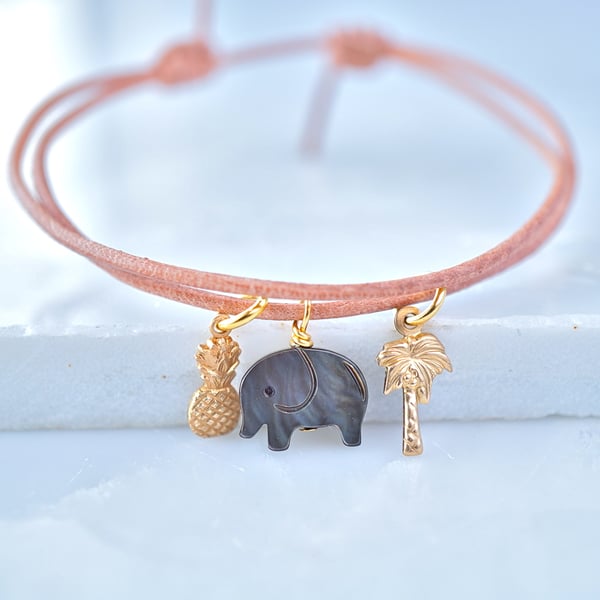 Image of Leather bracelet with elephant ,pineapple ,palm tree