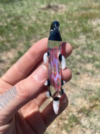 Image 1 of tooth milli 