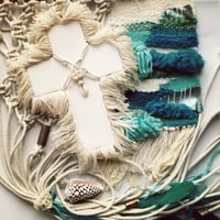 Image 1 of The Kahuna white fringed cross
