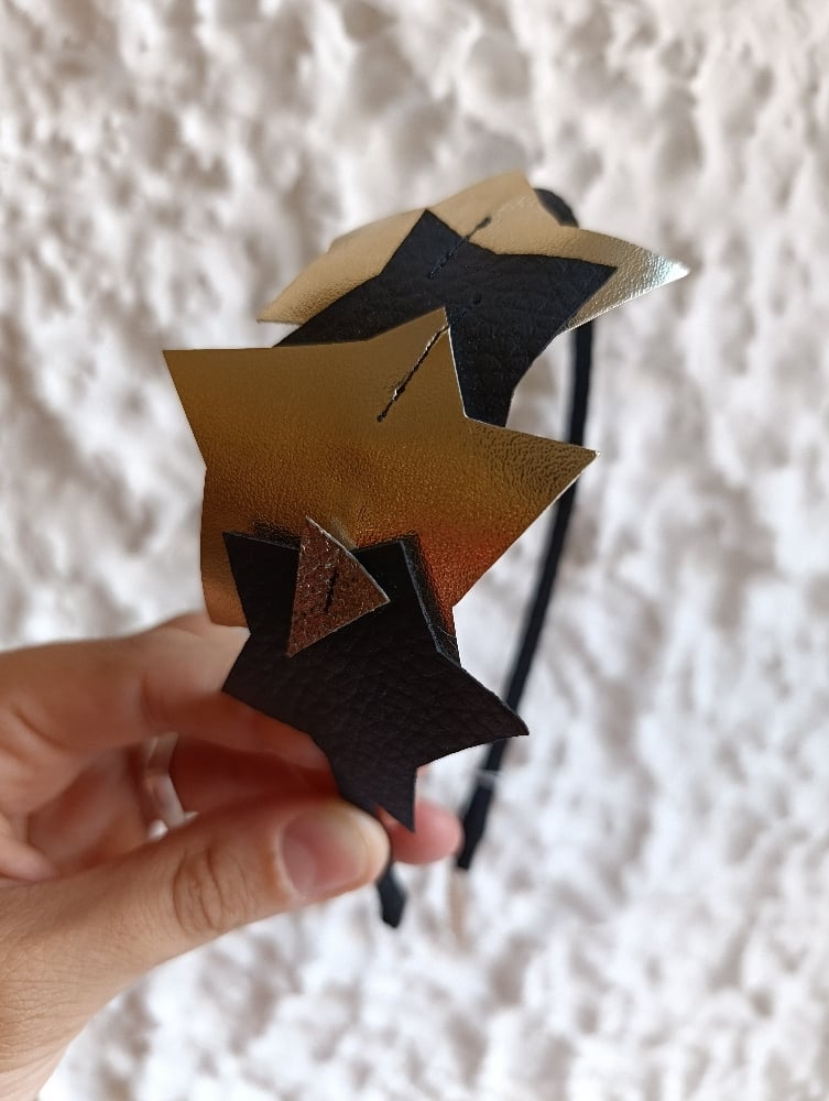 Image of Cerchietto stelle imperfette nero/oro