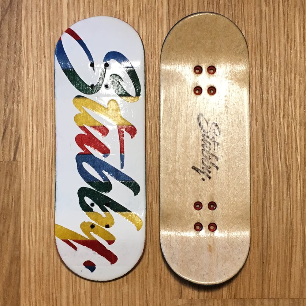 Image of Multicoloured Stubby Logo - White