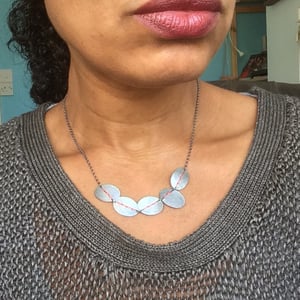 Image of Sewn Up 5 disc necklace