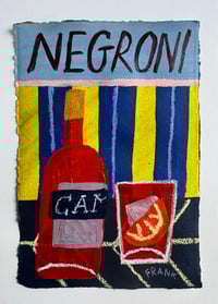 Negroni on klein blue and chartreuse stripes