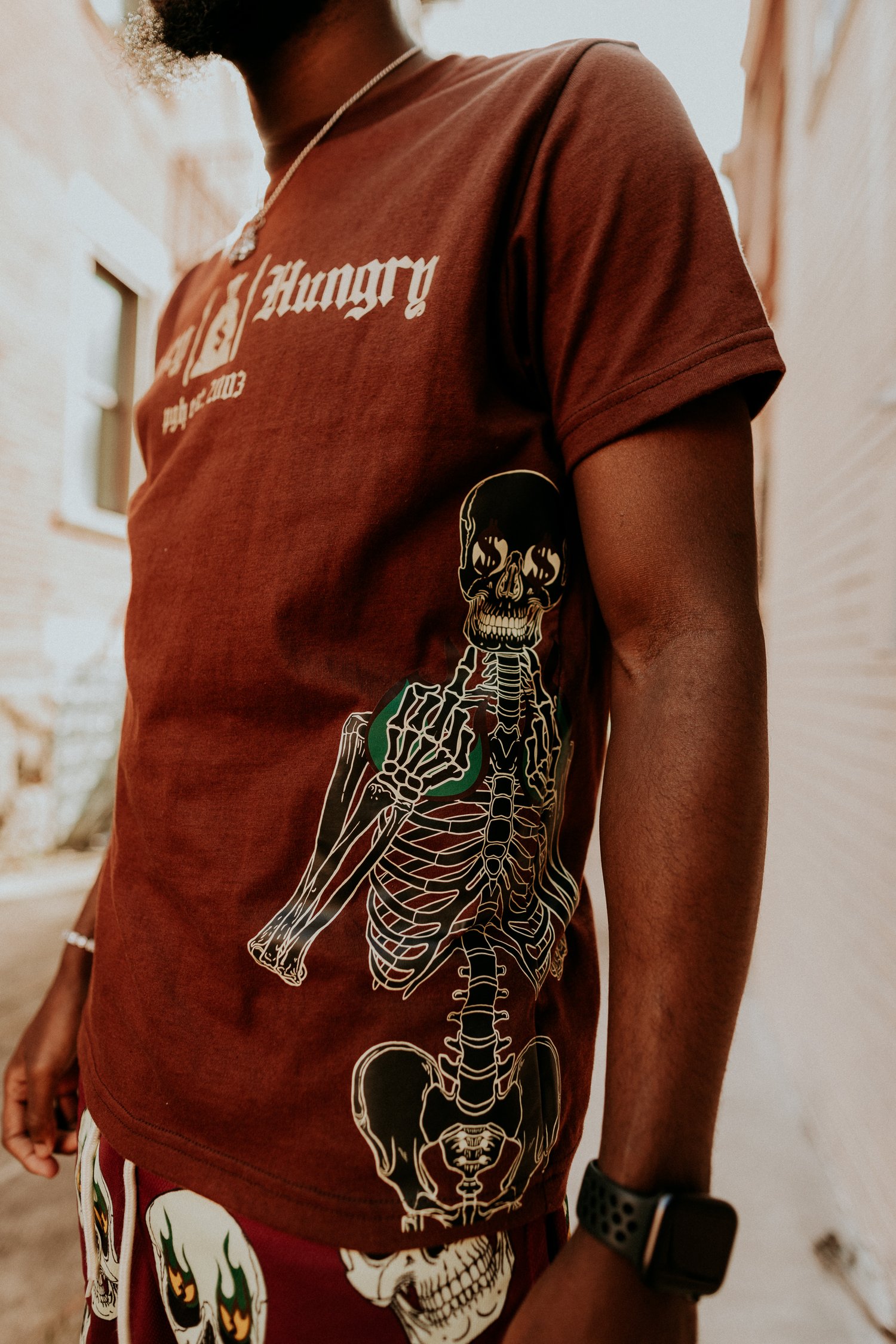 Image of Brown Money Hungry Skeleton Tee