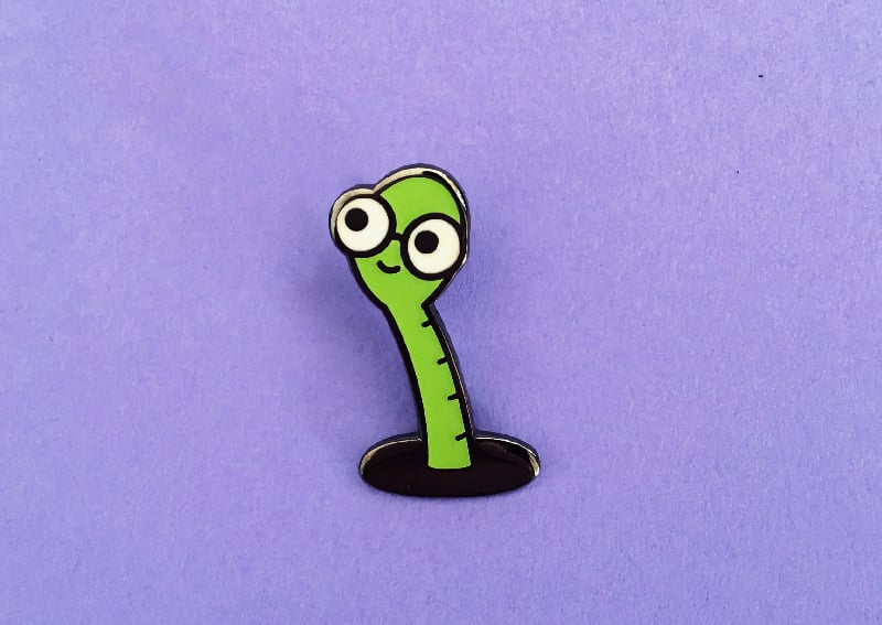 Image of Glow Worm 1" hard enamel pin