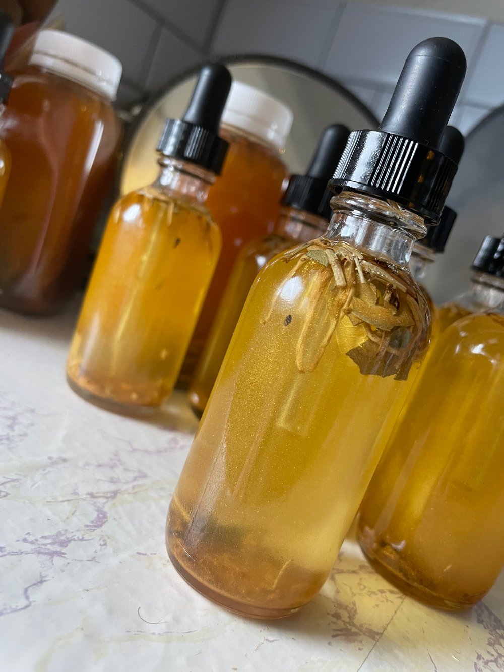 Image of “Think Big Bxtch” Jupiter Oil