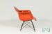 Image of Charles and Ray Eames Fiberglass Side Chair Orange Cats Cradle