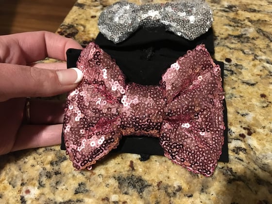 Image of Pink sequin bow cup sleeve