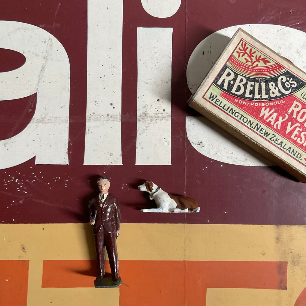 Image of Guy With Pipe,Dog & Matcbox