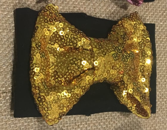 Image of Gold Sequin Bow Cup Sleeves