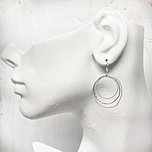Image of Illusion hiking hoops in sterling silver