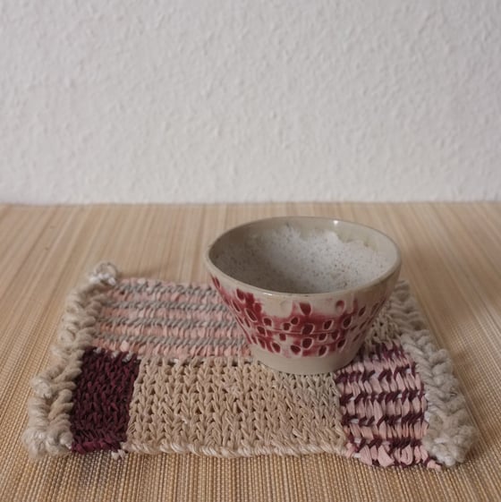 Image of Handmade ceramic olive bowl and woven rectangle mat