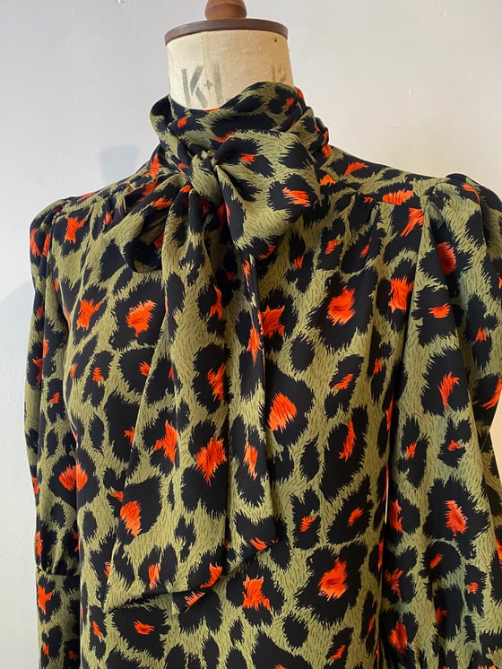 Image of Leopard tie neck pull on blouse