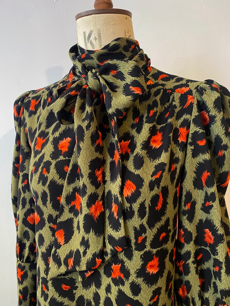 Image of Leopard tie neck pull on blouse