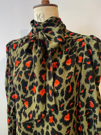 Image 1 of Leopard tie neck pull on blouse