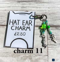 Image 11 of Ed’s hat ear charms