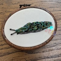 Image 1 of Shiny slug (a, 2.5 x 3 inches)