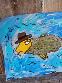 Image 3 of Fish Swimming In Hat