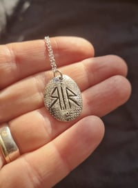 Silver Talisman Rest Is Resistance