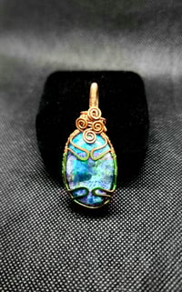 Electric Tide – Copper-Wrapped Blue Apatite Pendant