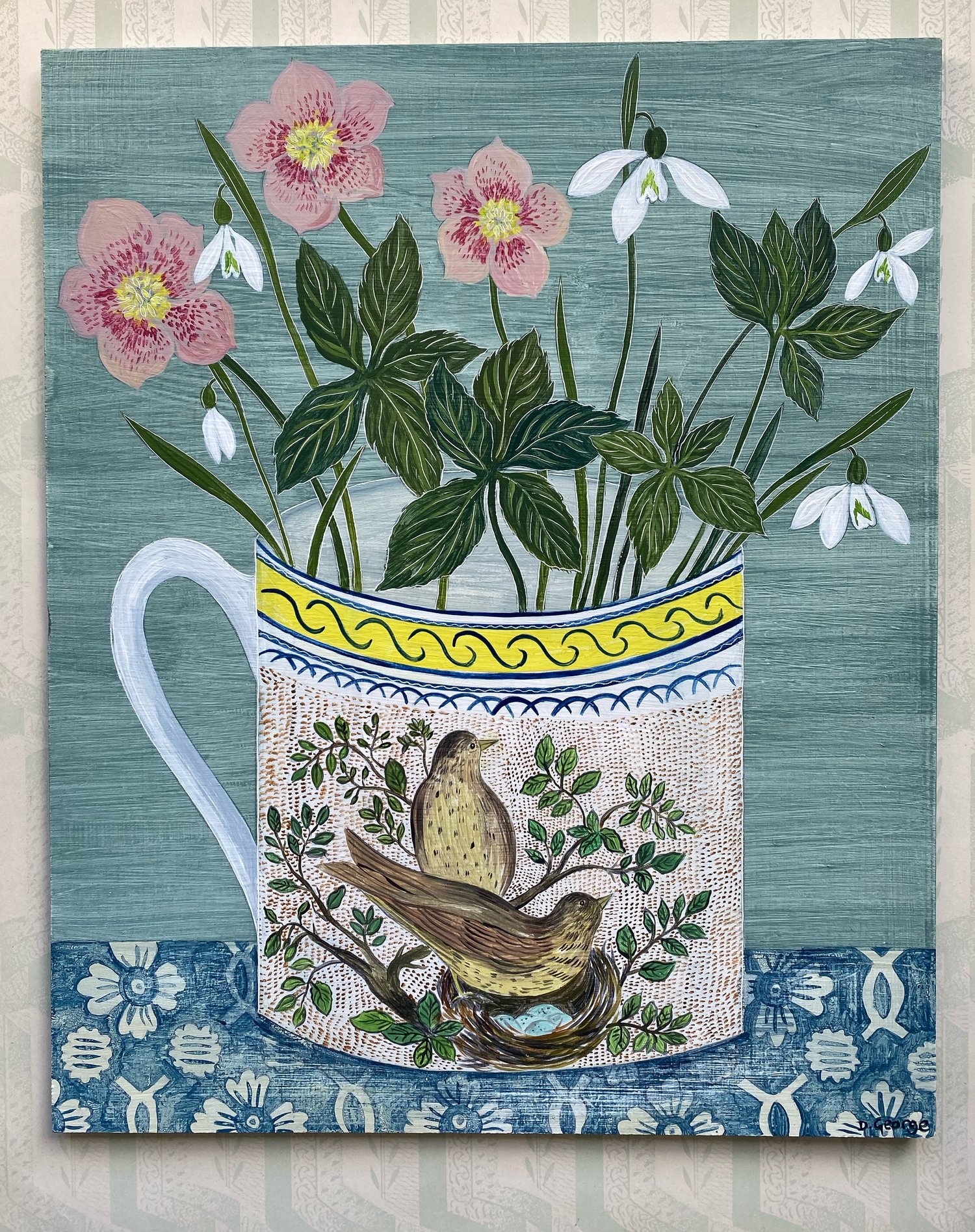 Image of Hellebores and Snowdrops in a bird cup