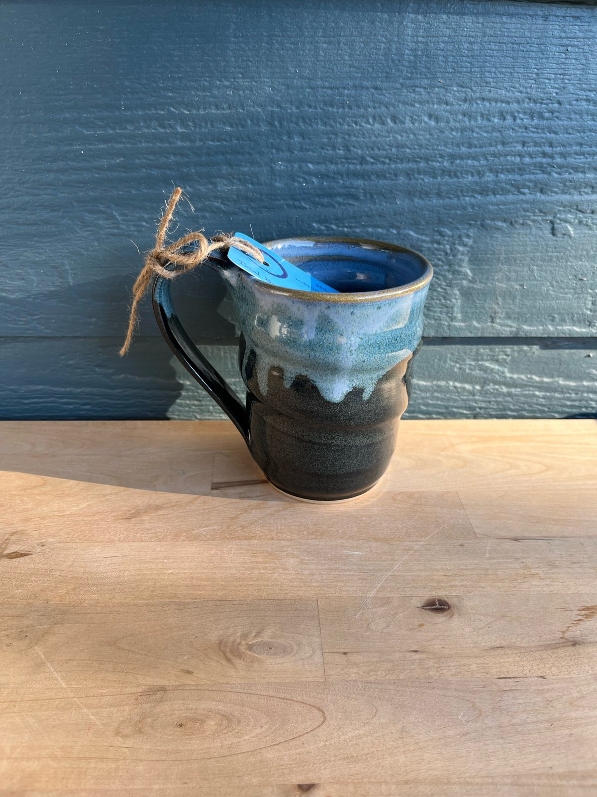 Image of M41 Larger, tall medium mug black with blue inside 