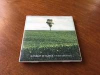 In Pursuit of Silence Ceramic Cup Coaster - Lonely Tree