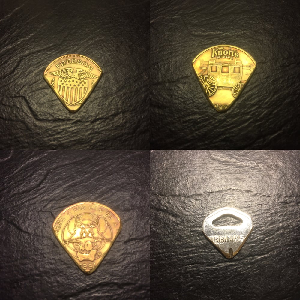 Image of Token key guitar pick