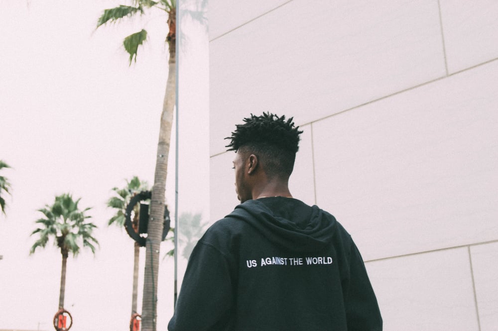 Image of US AGAINST THE WORLD ZIP UP