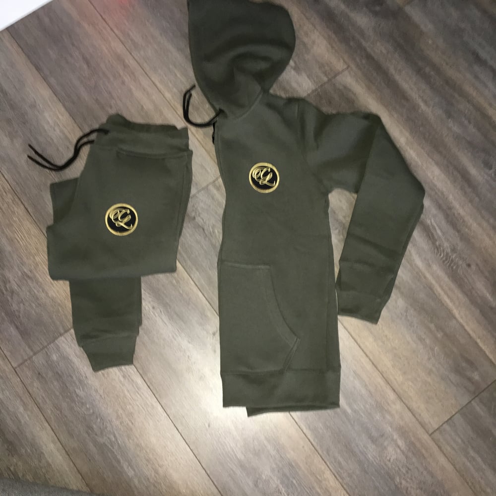 khaki track top