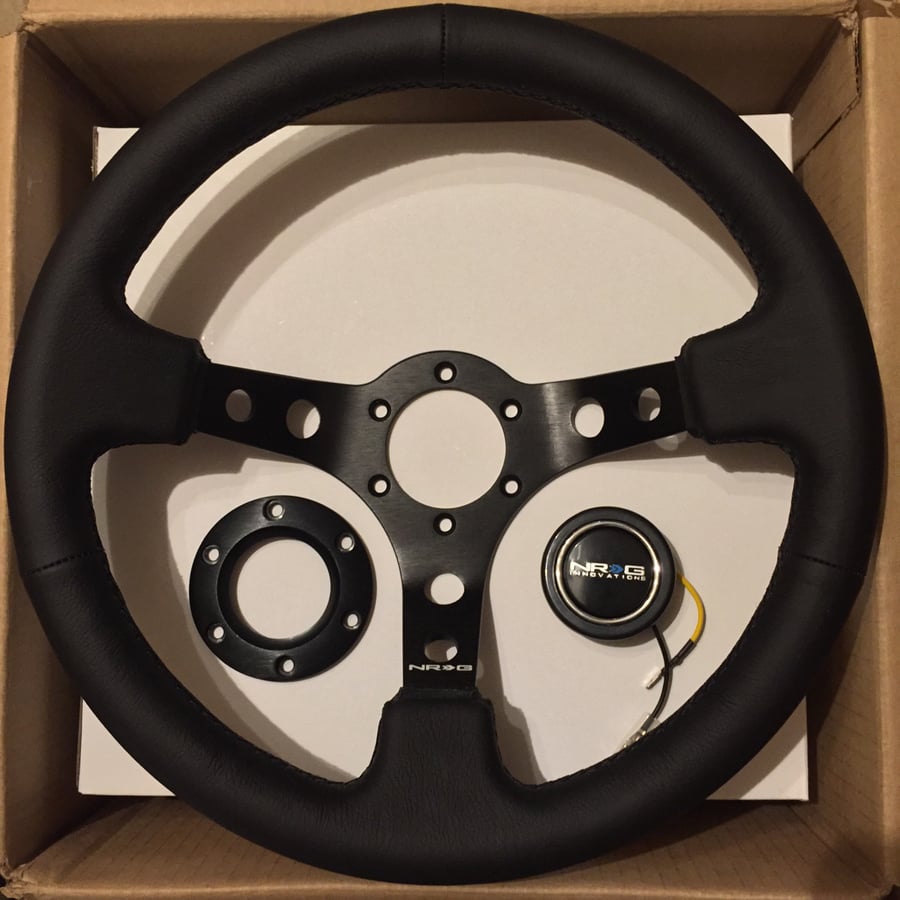 Image of New NRG Reinforced steering wheel