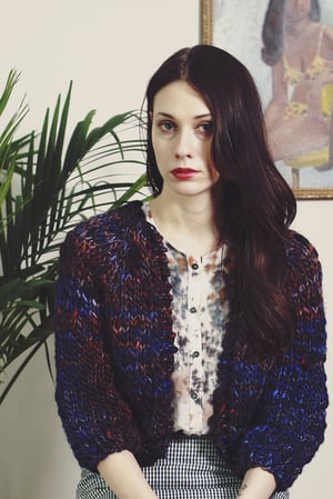 Image of perth merino wool hand knit cardigan (shown in natural w/ fringe)