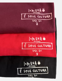 Image 2 of É Soul Cultura Una Dos 2 Falling down the cracks of sofa print T Shirt
