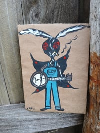 Image 1 of Mothman Playing Banjo 
