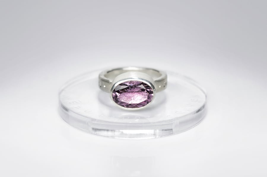 Image of "Everything divine and human" silver ring with amethyst  · DIVINA HUMANAQUE OMNIA ·
