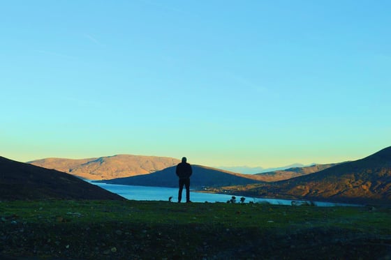 Image of silhouette amoungst the mountains